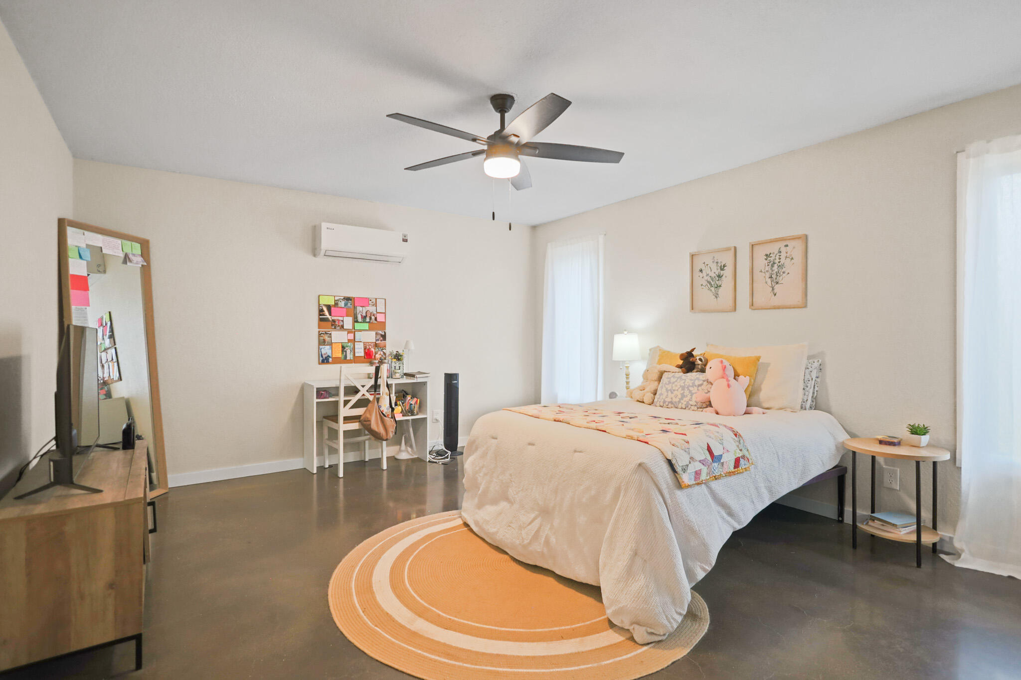 4302 42nd Street Lubbock, TX 79413 - Photo 31 of 67 a bedroom with a bed and a table