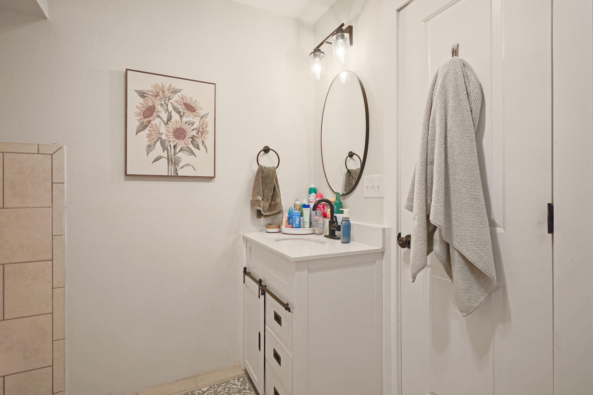 4302 42nd Street Lubbock, TX 79413 - Photo 37 of 67 a view of a bathroom with a sink