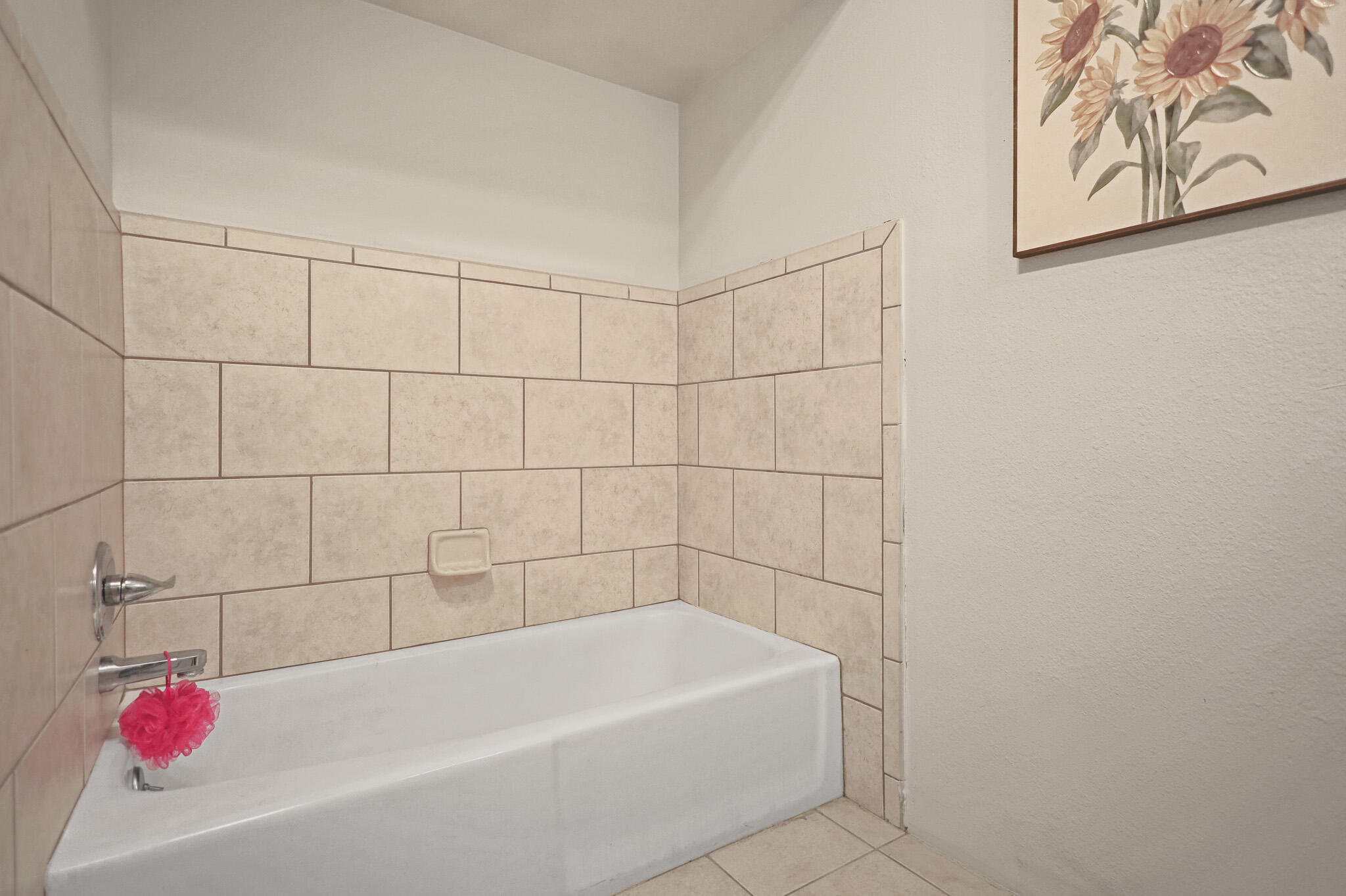 4302 42nd Street Lubbock, TX 79413 - Photo 39 of 67 a bathroom with a bathtub and shower
