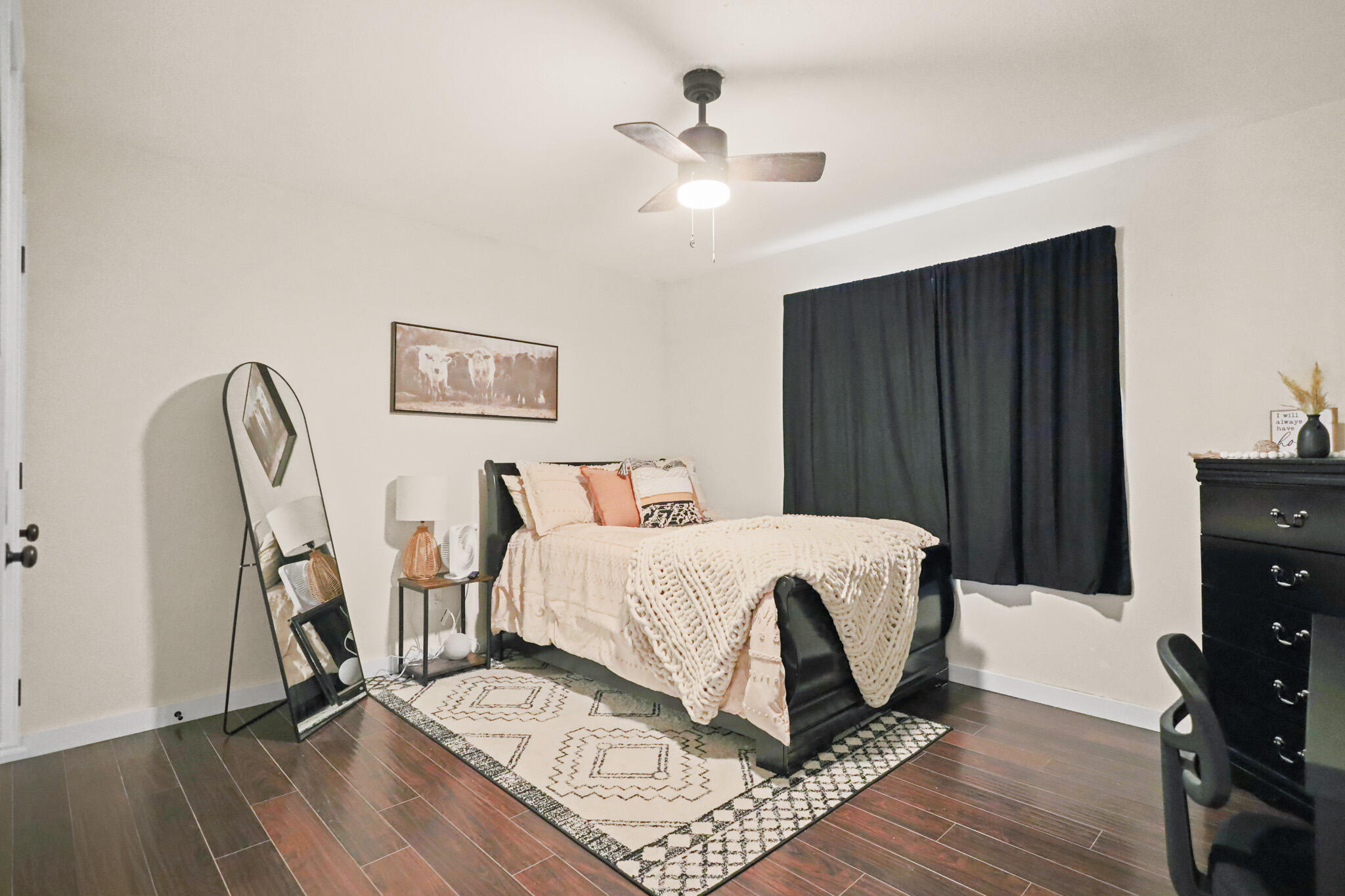 4302 42nd Street Lubbock, TX 79413 - Photo 45 of 67 a bed room with a bed and a chair