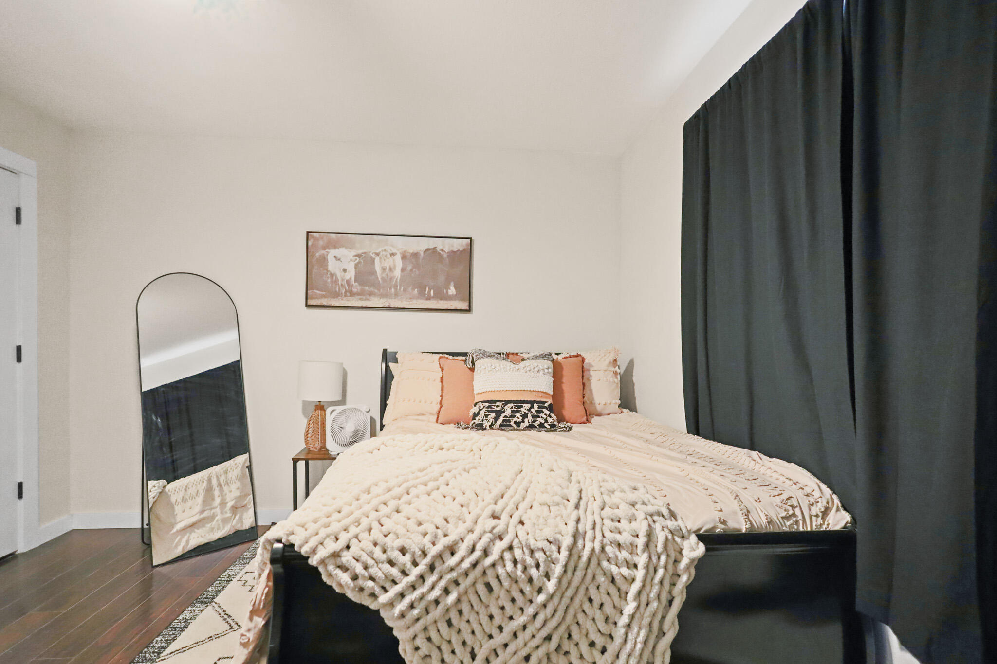 4302 42nd Street Lubbock, TX 79413 - Photo 46 of 67 a bedroom with a bed and a view of bathroom