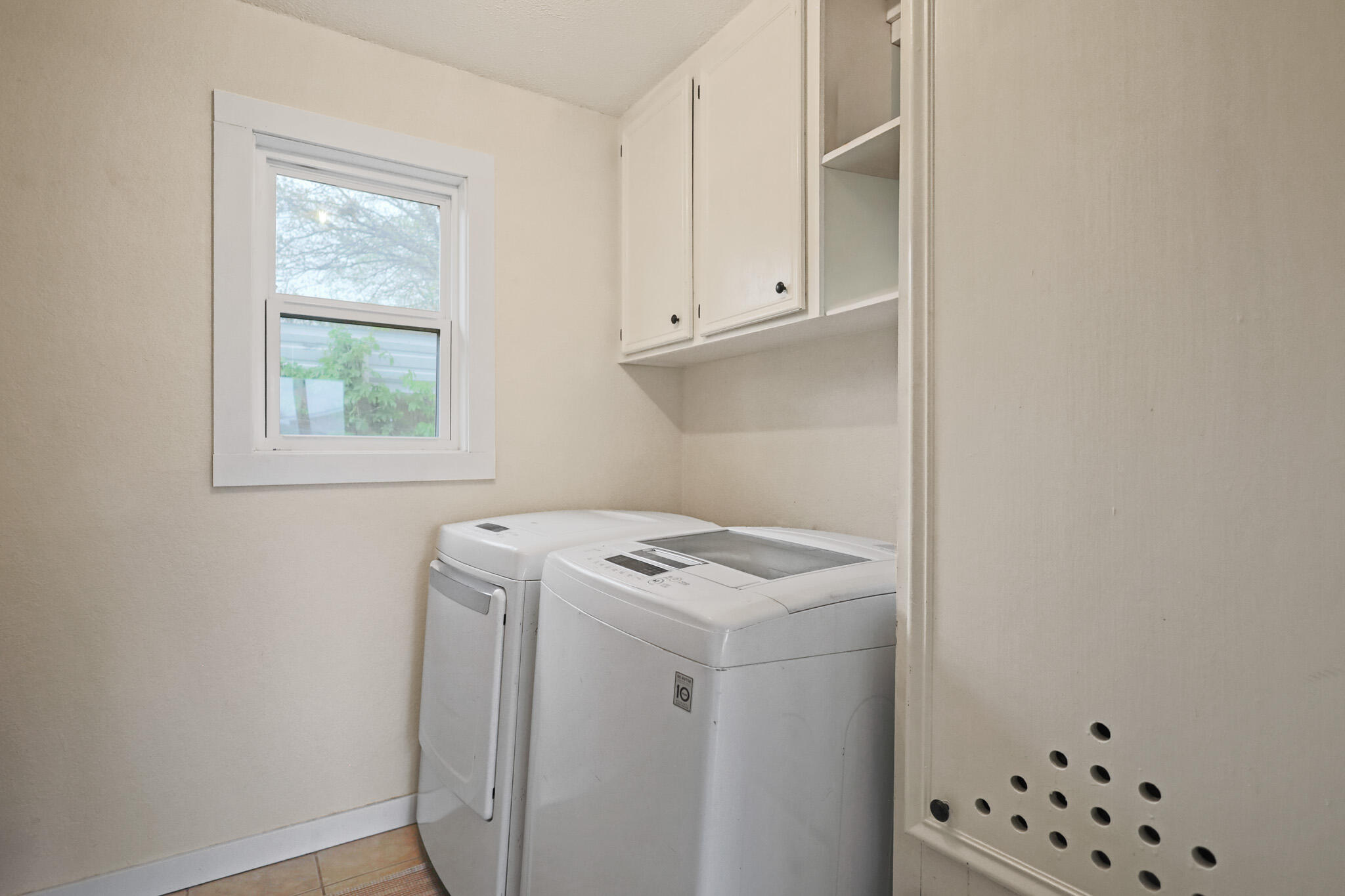 4302 42nd Street Lubbock, TX 79413 - Photo 54 of 67 a utility room with dryer and washer