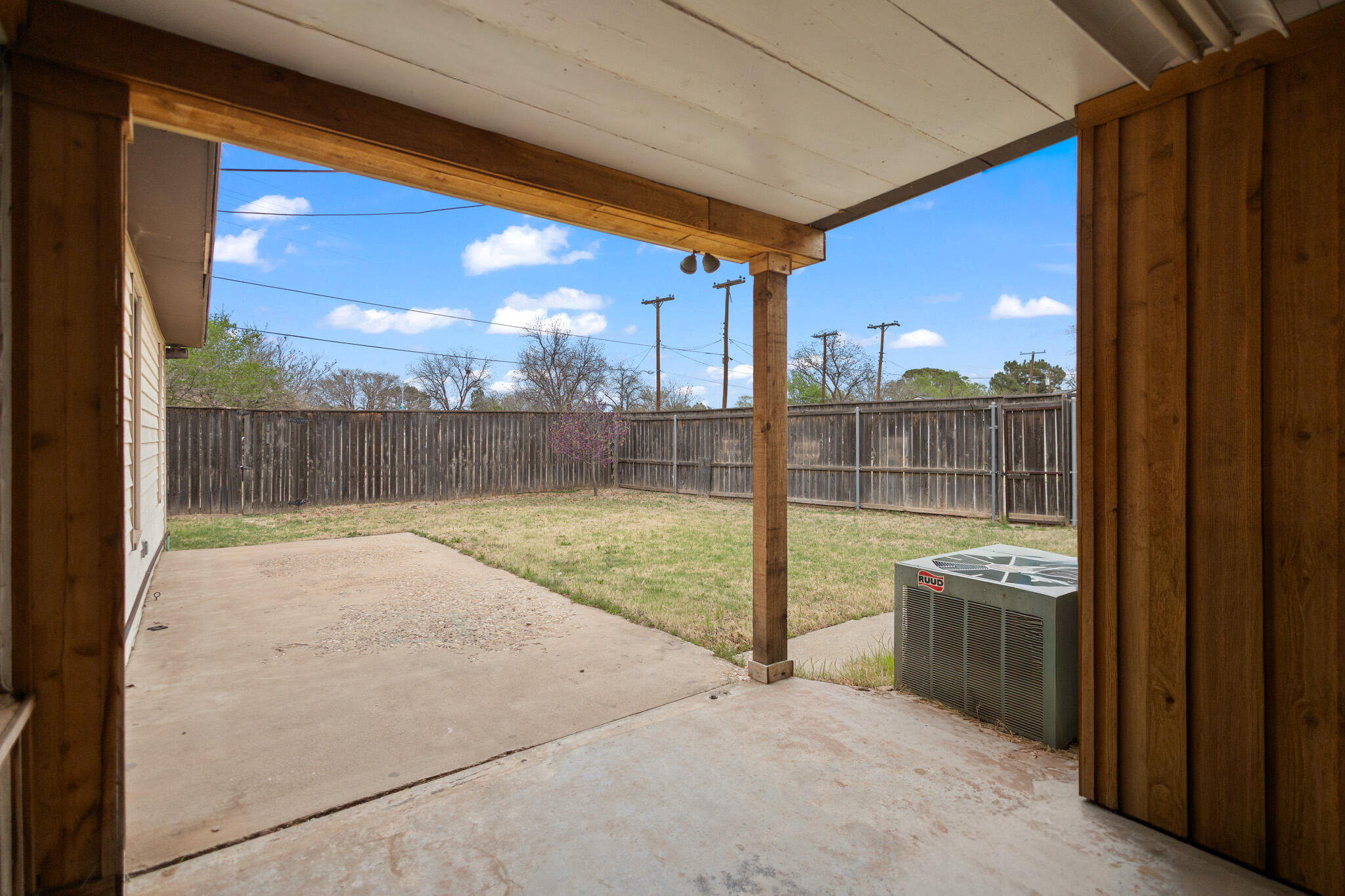 4302 42nd Street Lubbock, TX 79413 - Photo 56 of 67 a view of a porch with a table and chairs