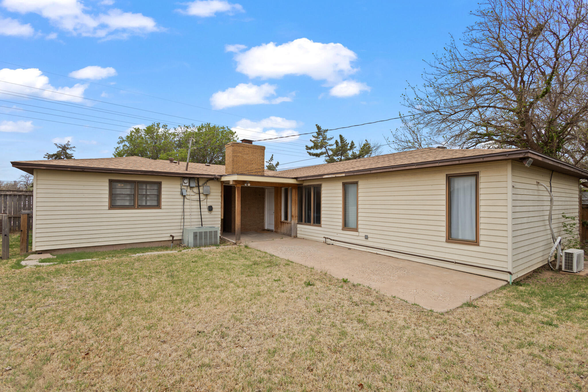 4302 42nd Street Lubbock, TX 79413 - Photo 59 of 67 a view of a house with a backyard