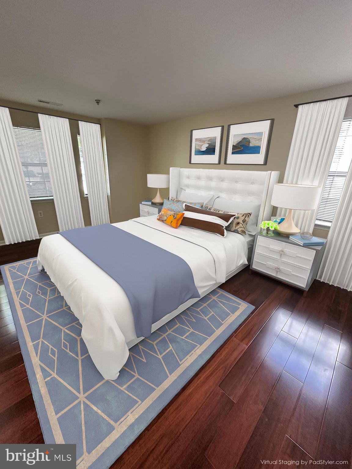 8378 Montgomery Run Road, Unit A Ellicott City, MD 21043 - Photo 15 of 27 Light Filled Primary Bedroom