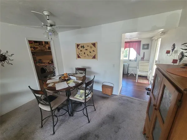 a view of a livingroom and dining room