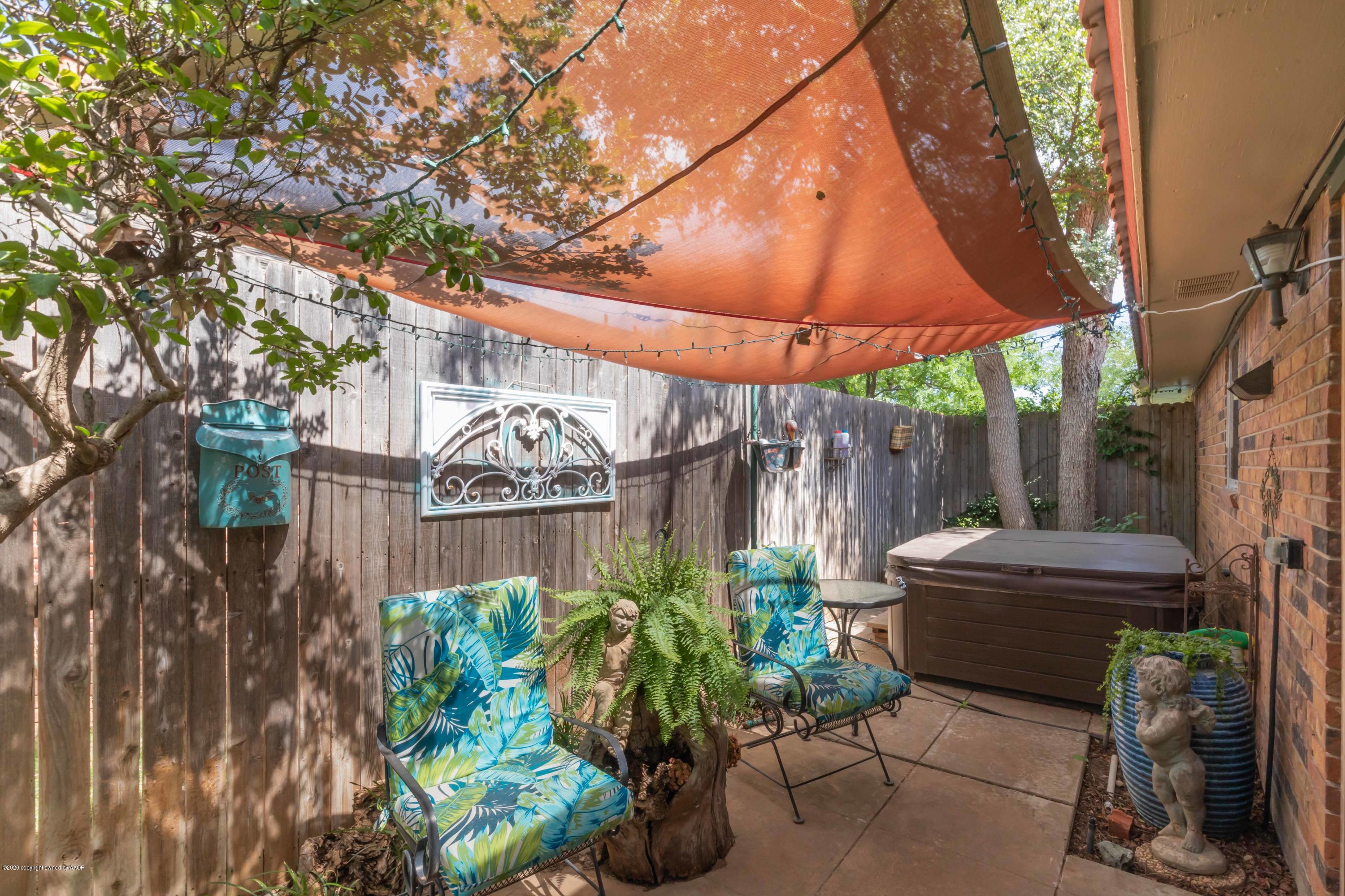 7103 Elmhurst Road Amarillo, TX 79106 - Photo 34 of 40 a view of a backyard with plants and a garden