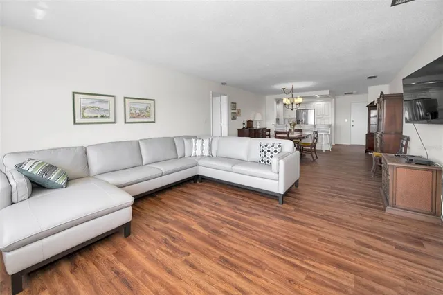 a bathroom with a sink vanity and mirror