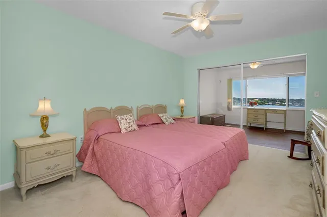 a view of a balcony with wooden floor