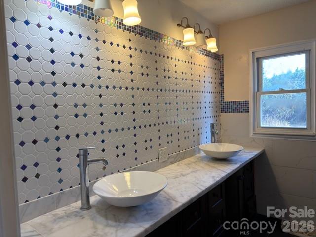 5376 Rhoney Road Connelly Springs, NC 28612 - Photo 11 of 21 a bathroom with a sink toilet and shower