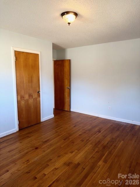 5376 Rhoney Road Connelly Springs, NC 28612 - Photo 14 of 21 a view of an empty room with wooden floor