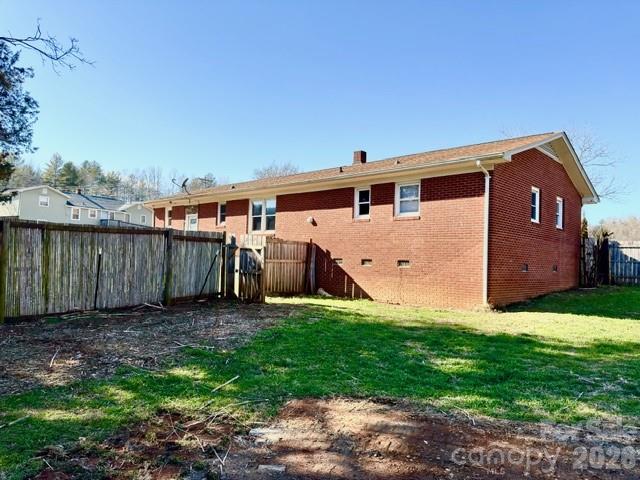 5376 Rhoney Road Connelly Springs, NC 28612 - Photo 17 of 21 a front view of a house with a yard and garage