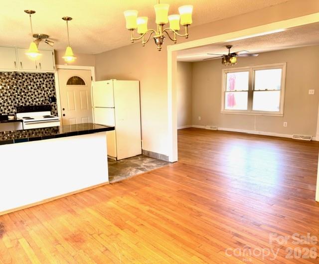 5376 Rhoney Road Connelly Springs, NC 28612 - Photo 5 of 21 a view of a kitchen with a sink and wooden floor