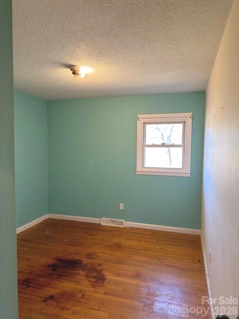 5376 Rhoney Road Connelly Springs, NC 28612 - Photo 10 of 21 a view of a room with wooden floor and windows