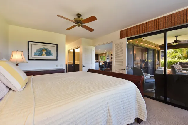 a bathroom with a double vanity sink a mirror and a shower