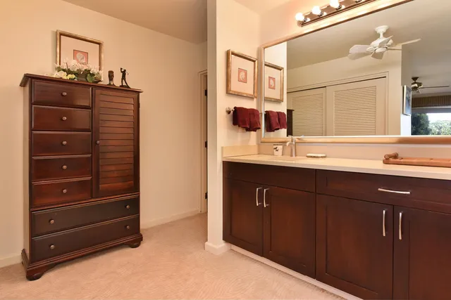 a bathroom with a tub and shower