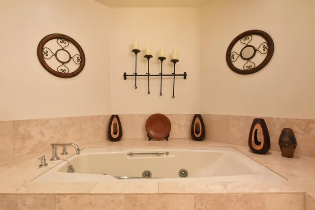a view of a hallway with living room and a kitchen