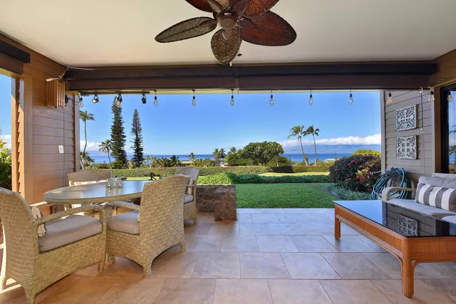 a view of an chairs and tables in the patio