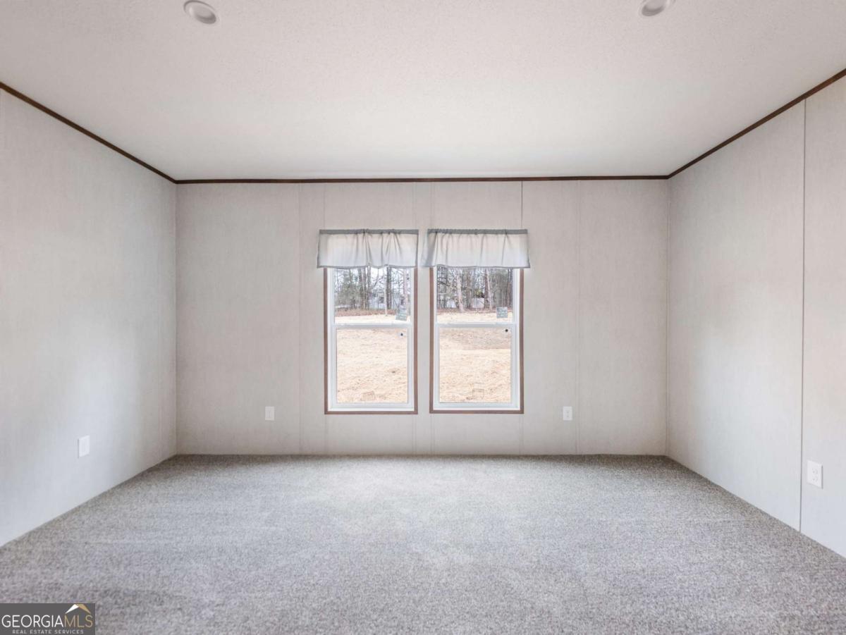 5224 Bogus Road Gainesville, GA 30506 - Photo 14 of 43 an empty room with a empty space and windows