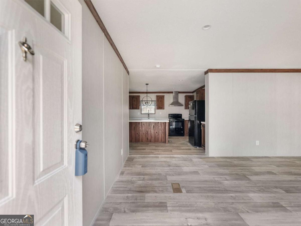 5224 Bogus Road Gainesville, GA 30506 - Photo 2 of 43 a view of a kitchen with a refrigerator and a window