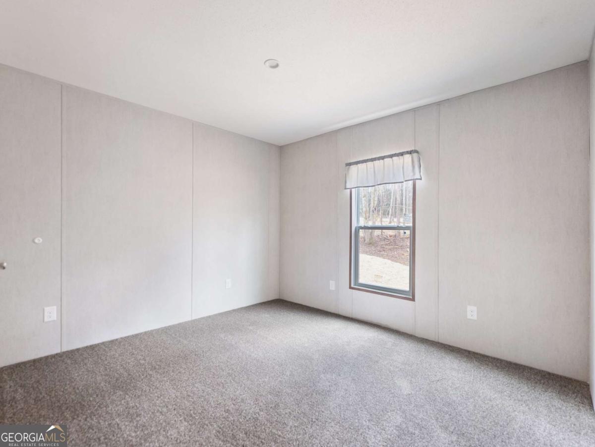 5224 Bogus Road Gainesville, GA 30506 - Photo 28 of 43 a view of a room that has a window in it