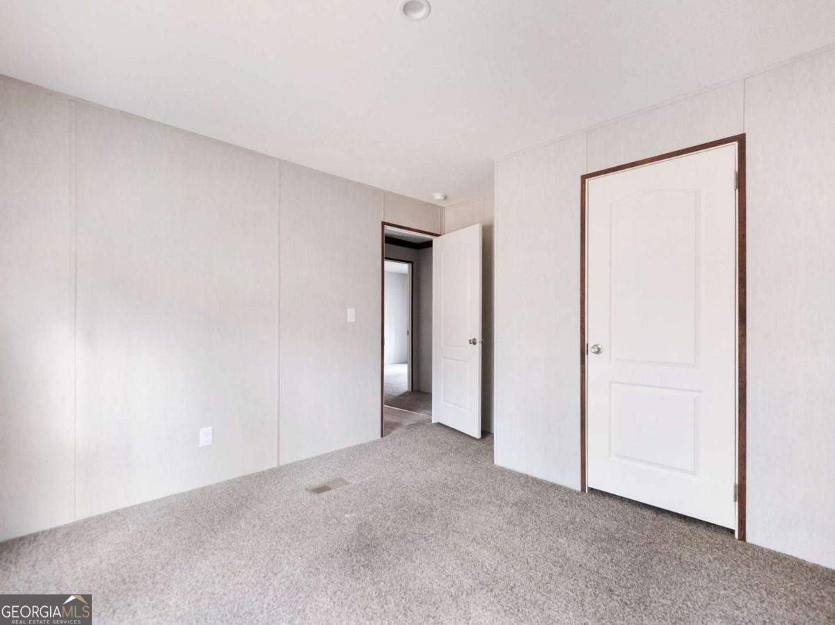 5224 Bogus Road Gainesville, GA 30506 - Photo 29 of 43 a view of an empty room and closet area