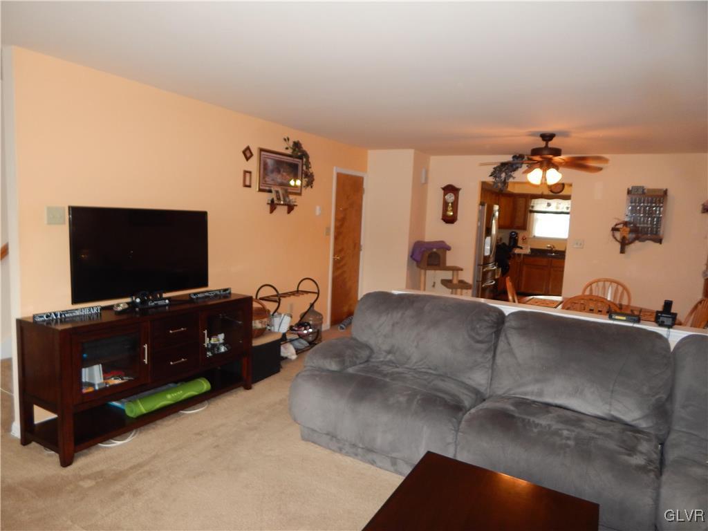326 Chestnut Street Slatington, PA 18080 - Photo 8 of 14 a living room with furniture and a flat screen tv