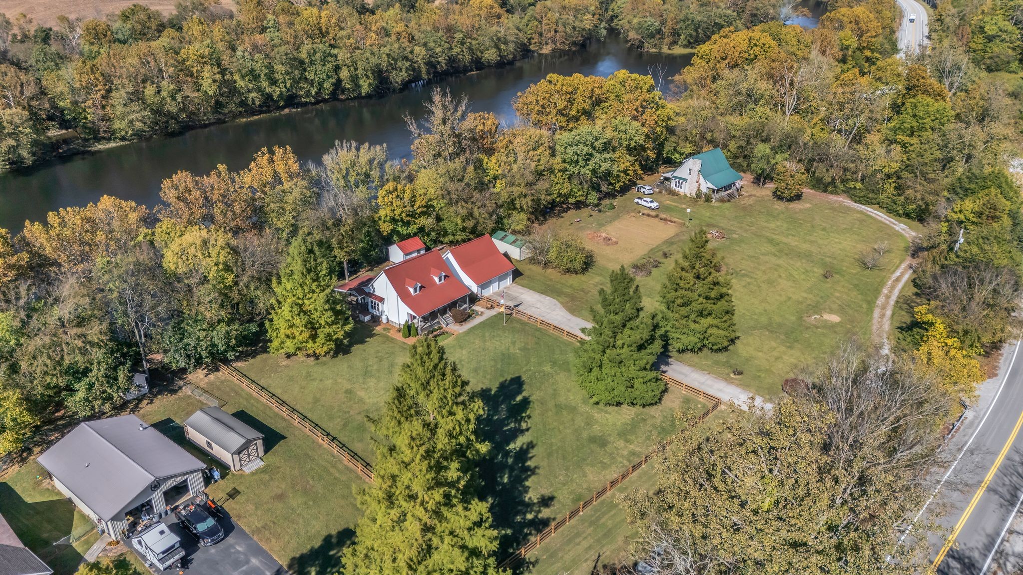 6285 Medley Amonette Road Buffalo Valley, TN 38548 - Photo 2 of 41 an aerial view of residential house with outdoor space and lake view