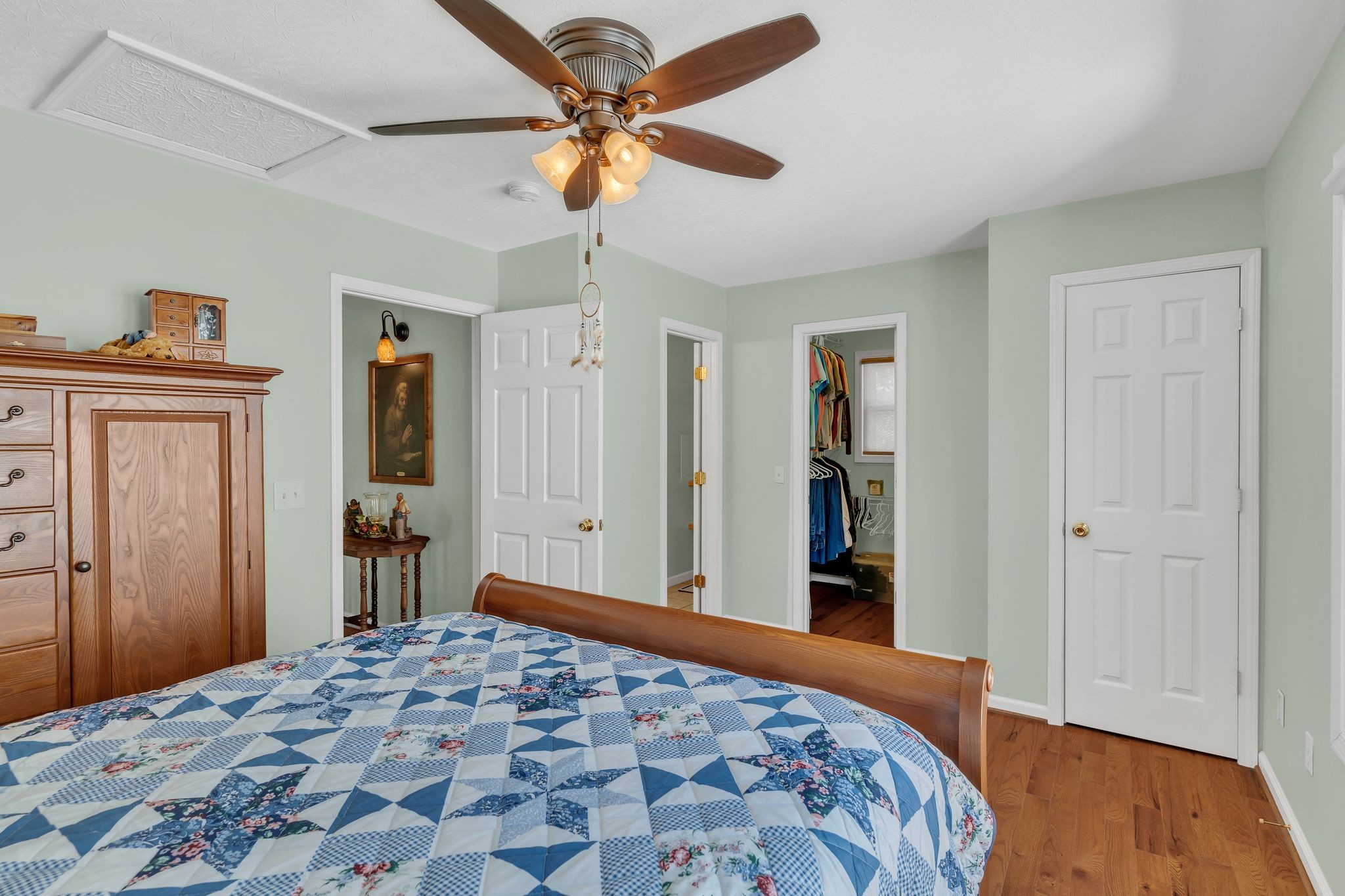 6285 Medley Amonette Road Buffalo Valley, TN 38548 - Photo 21 of 41 a bedroom with a bed and a chandelier