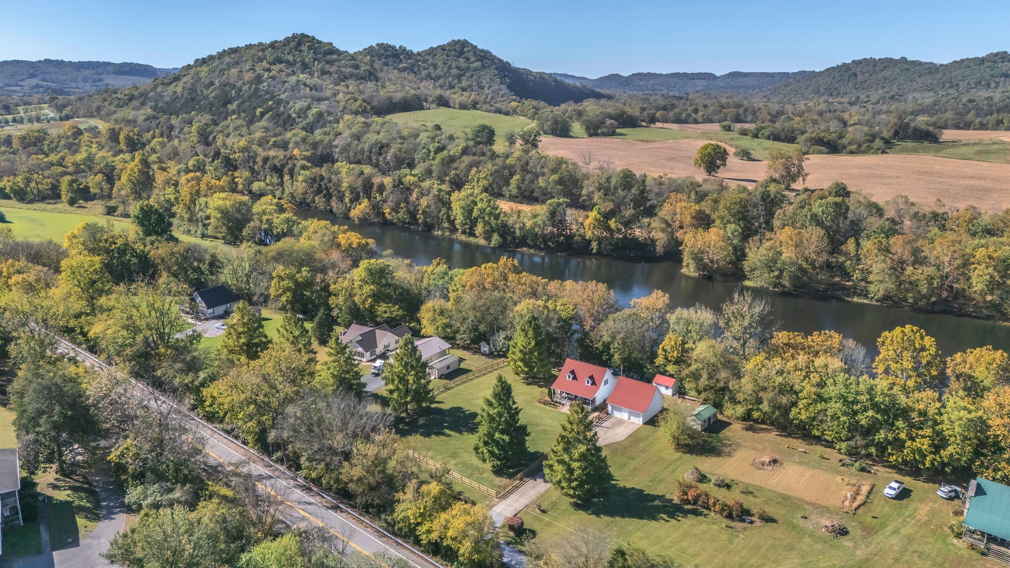 6285 Medley Amonette Road Buffalo Valley, TN 38548 - Photo 36 of 41 an aerial view of lake residential house with swimming pool and green space