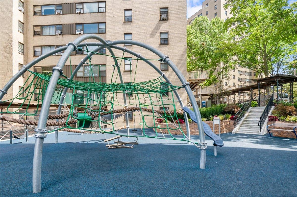 3 Fordham Hill Ovl, Unit 10B Bronx, NY 10468 - Photo 19 of 33 View of jungle gym with stairway