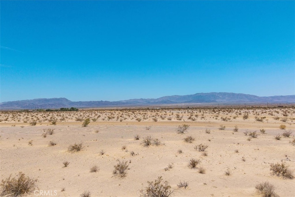 82935 Maya Rada Road Twentynine Palms, CA 92277 - Photo 10 of 30 a view of beach and a yard