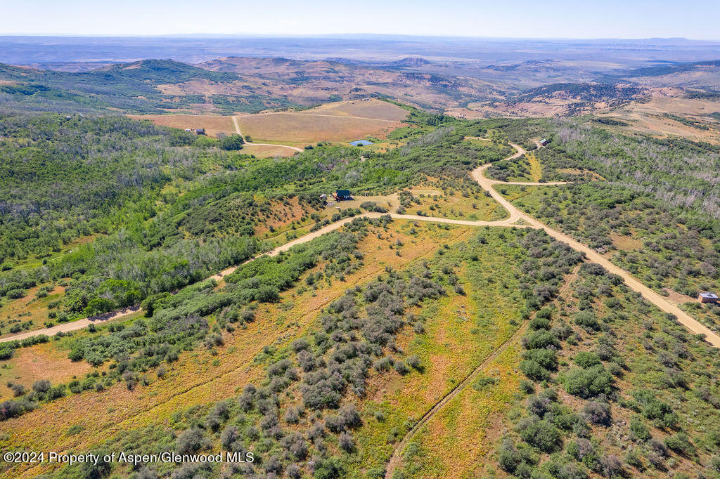 1750 Fiddleneck Drive Craig, CO 81625 - Photo 11 of 16 a view of a city with mountains in the background