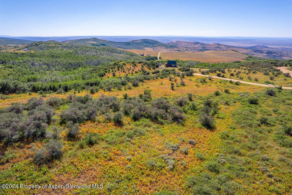 1750 Fiddleneck Drive Craig, CO 81625 - Photo 4 of 16 a view of a city with mountains in the background