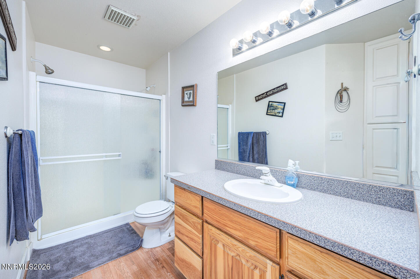 374 Calaway Court Fallon, NV 89406 - Photo 10 of 18 a bathroom with a sink a toilet and shower