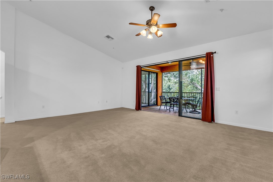 3799 Costa Maya Way, Unit 202 Estero, FL 33928 - Photo 29 of 42 a view of an empty room with a window