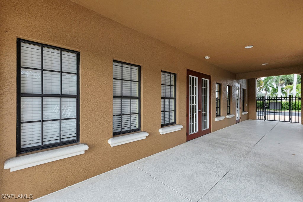 3799 Costa Maya Way, Unit 202 Estero, FL 33928 - Photo 40 of 42 a view of an empty room with windows