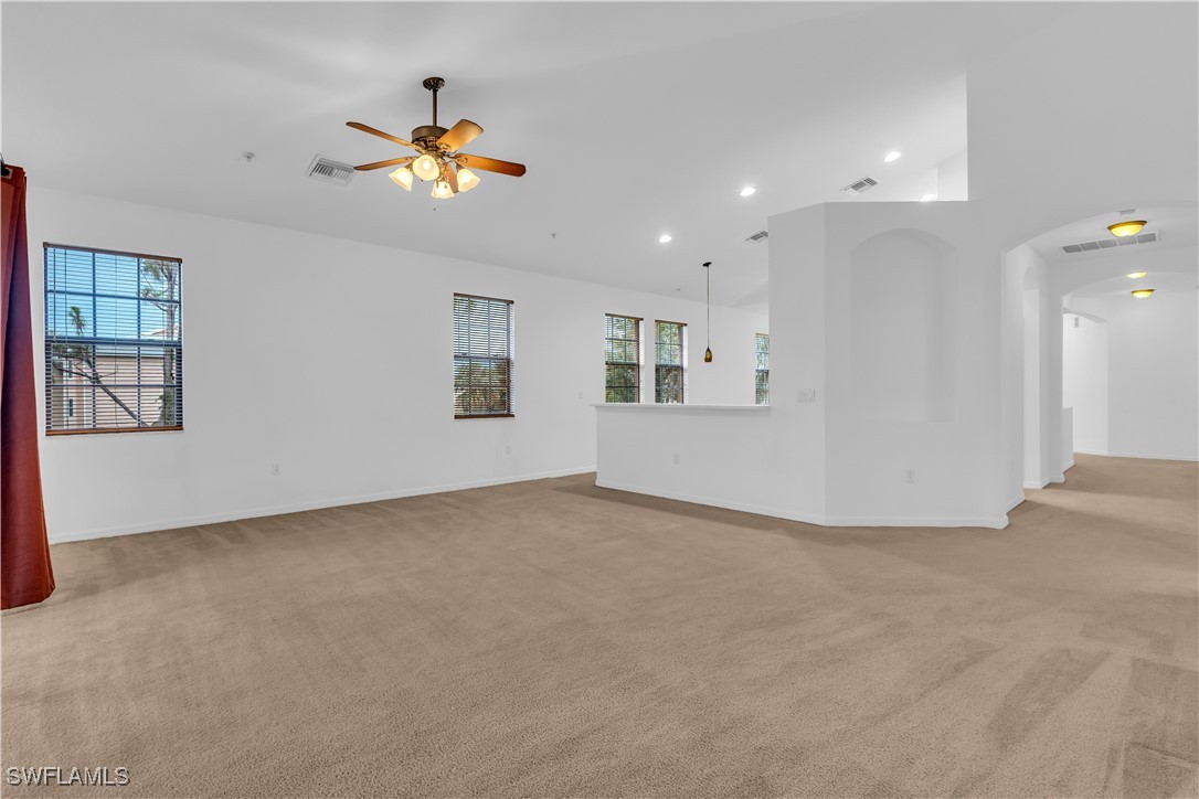 3799 Costa Maya Way, Unit 202 Estero, FL 33928 - Photo 10 of 42 a view of an empty room with a window