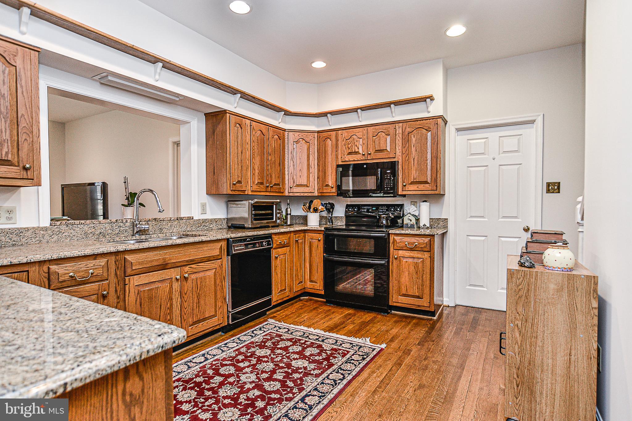 1819 Beulah Road Vienna, VA 22182 - Photo 20 of 43 Kitchen with back staircase to upstairs