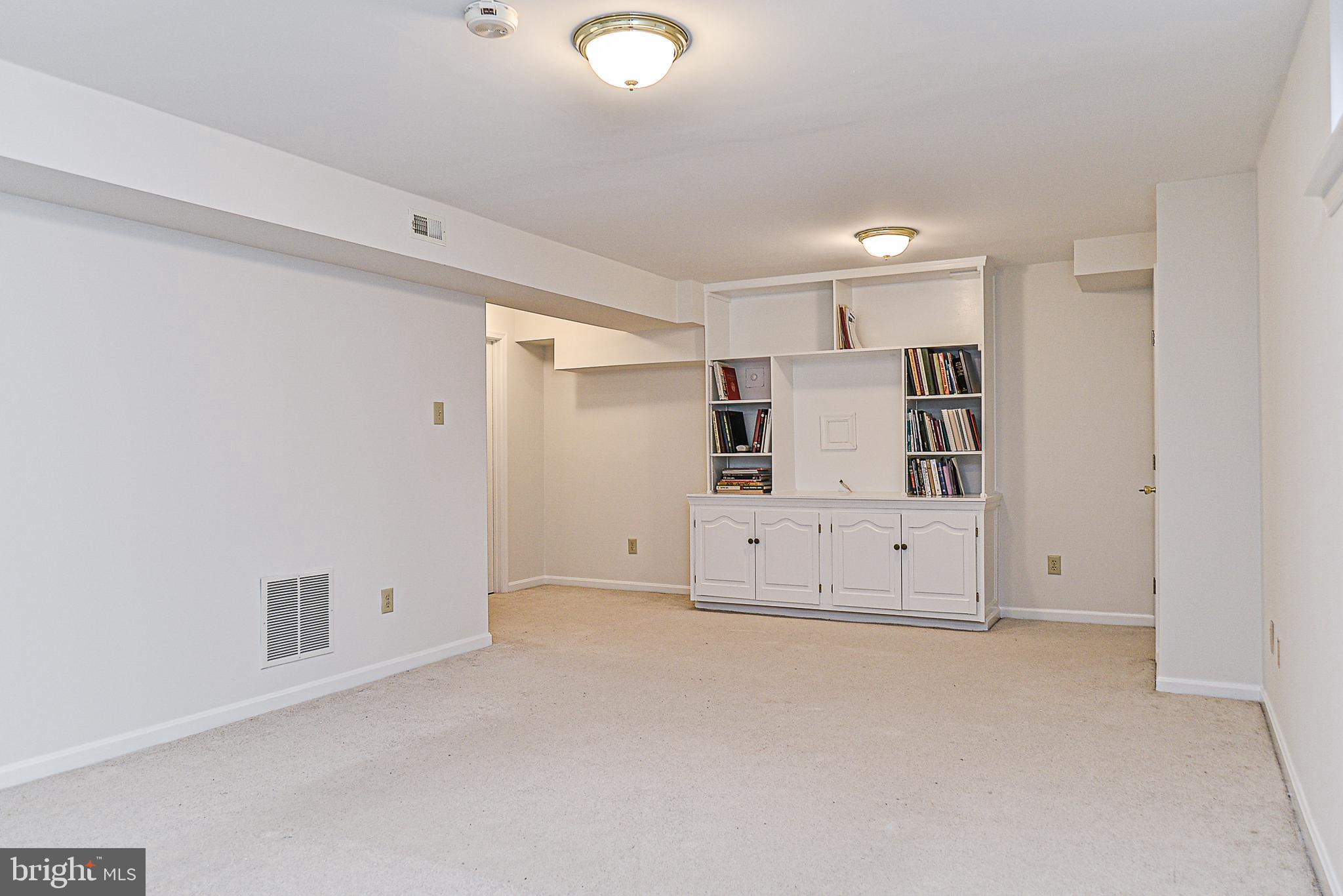 1819 Beulah Road Vienna, VA 22182 - Photo 38 of 43 Lower level with built in bookshelves.