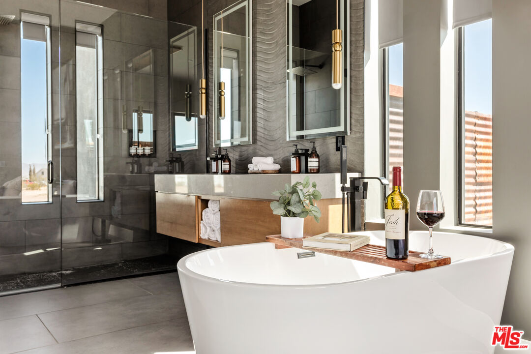 3000 Rockwood Road Joshua Tree, CA 92252 - Photo 7 of 71 a bathroom with a sink and a mirror