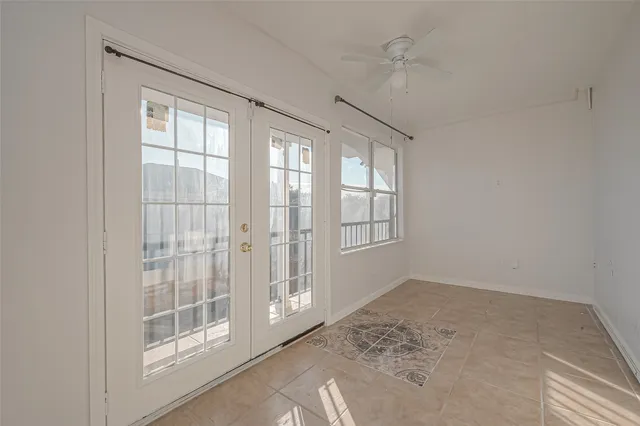 an empty room with windows