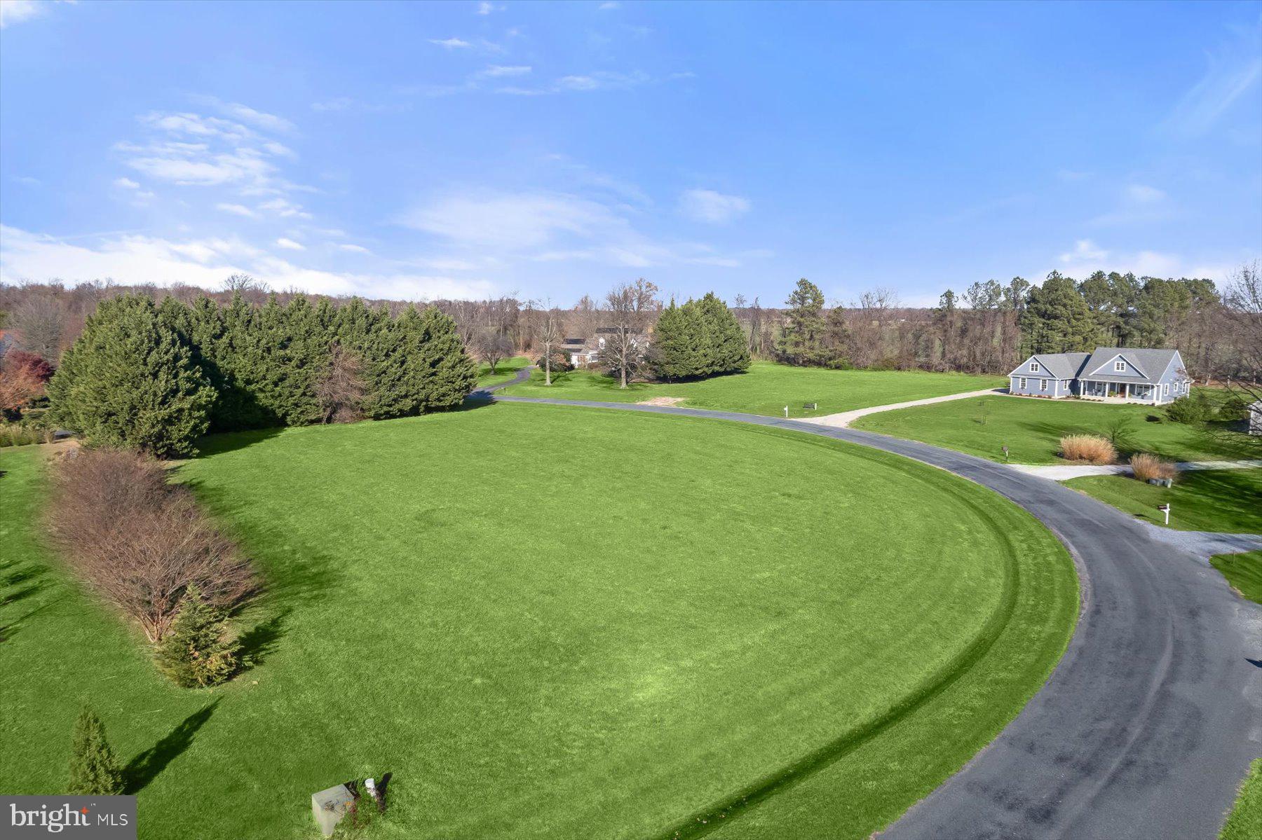 30 Hagy Road Rock Hall, MD 21661 - Photo 14 of 46 a view of a golf course with a garden