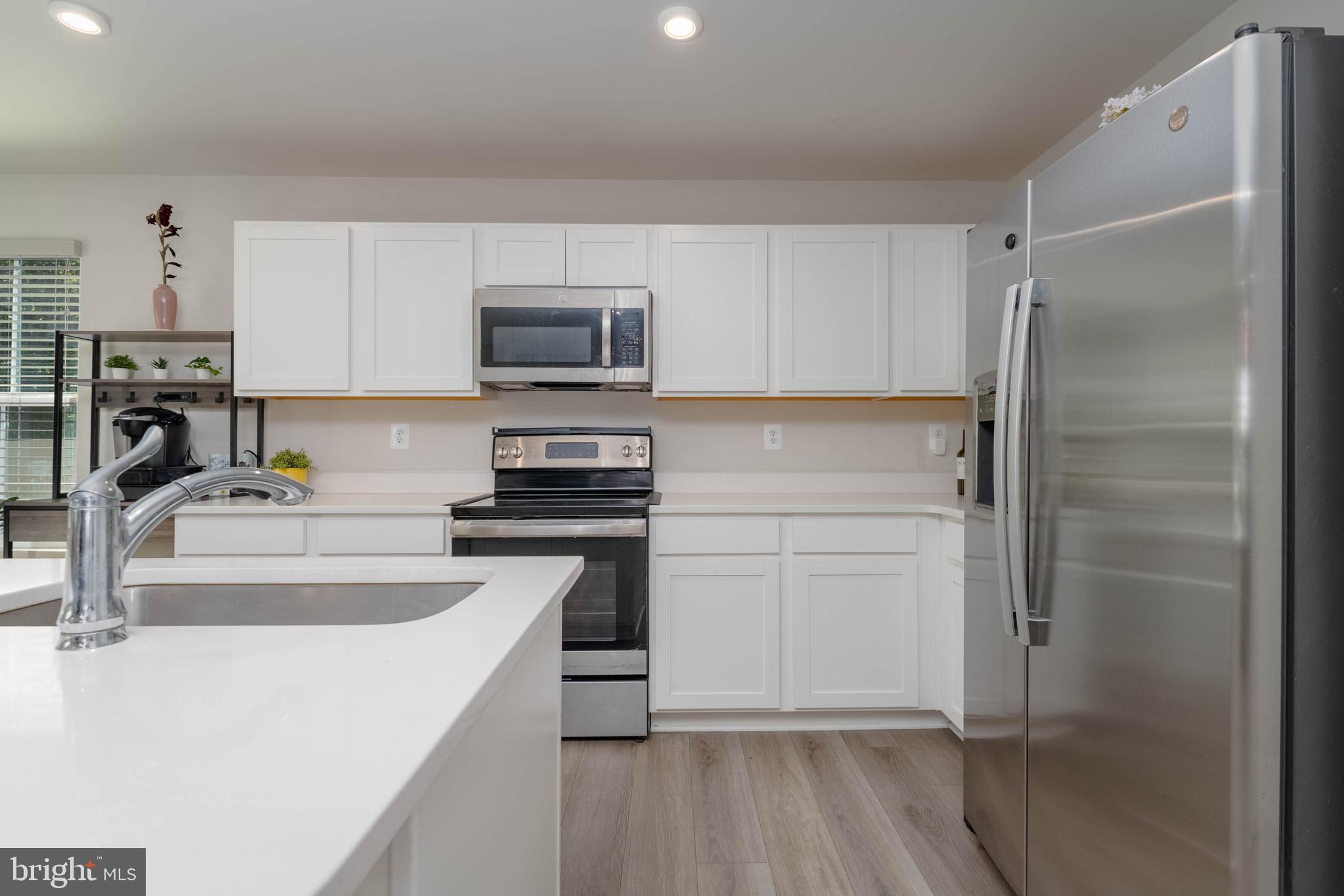 25 Teatree Lane Elkton, MD 21921 - Photo 11 of 38 a kitchen with a refrigerator stove and sink