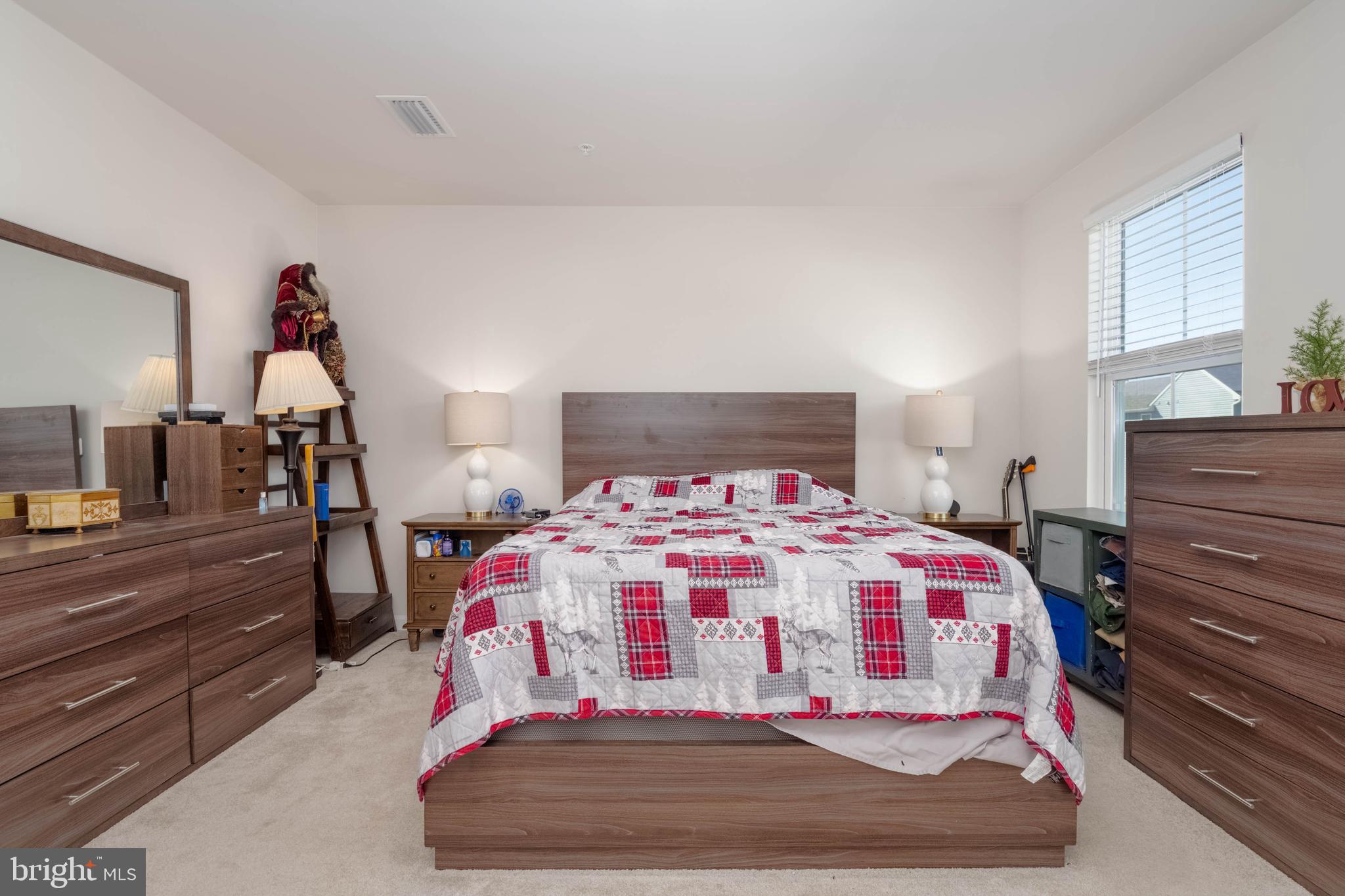 25 Teatree Lane Elkton, MD 21921 - Photo 19 of 38 a bedroom with a bed and wooden floor