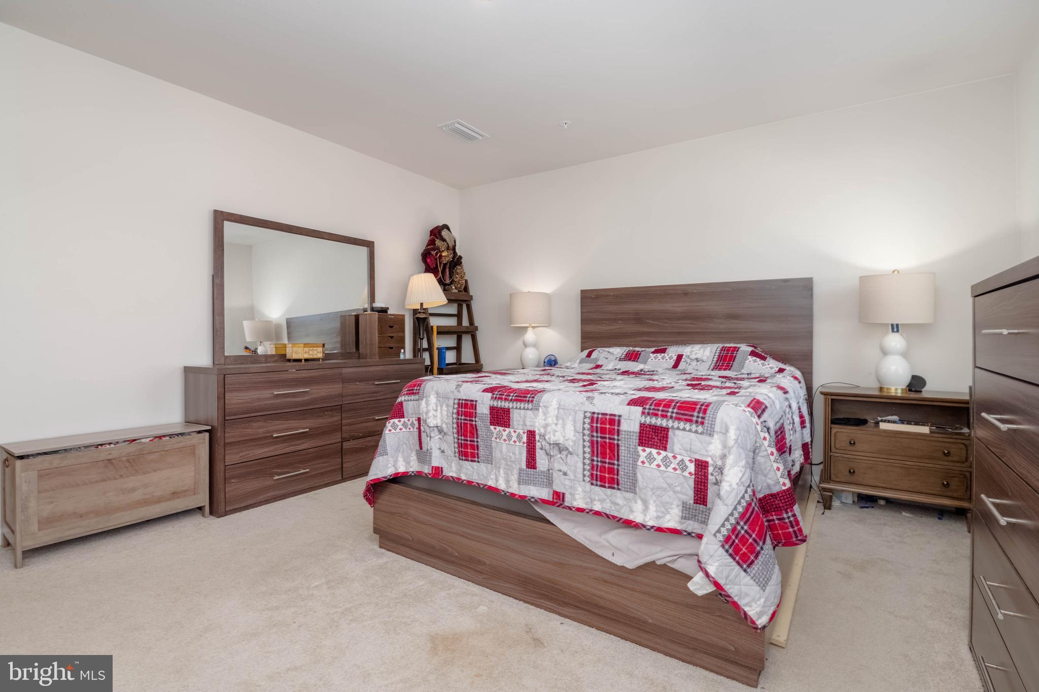 25 Teatree Lane Elkton, MD 21921 - Photo 20 of 38 a bedroom with a bed and dresser