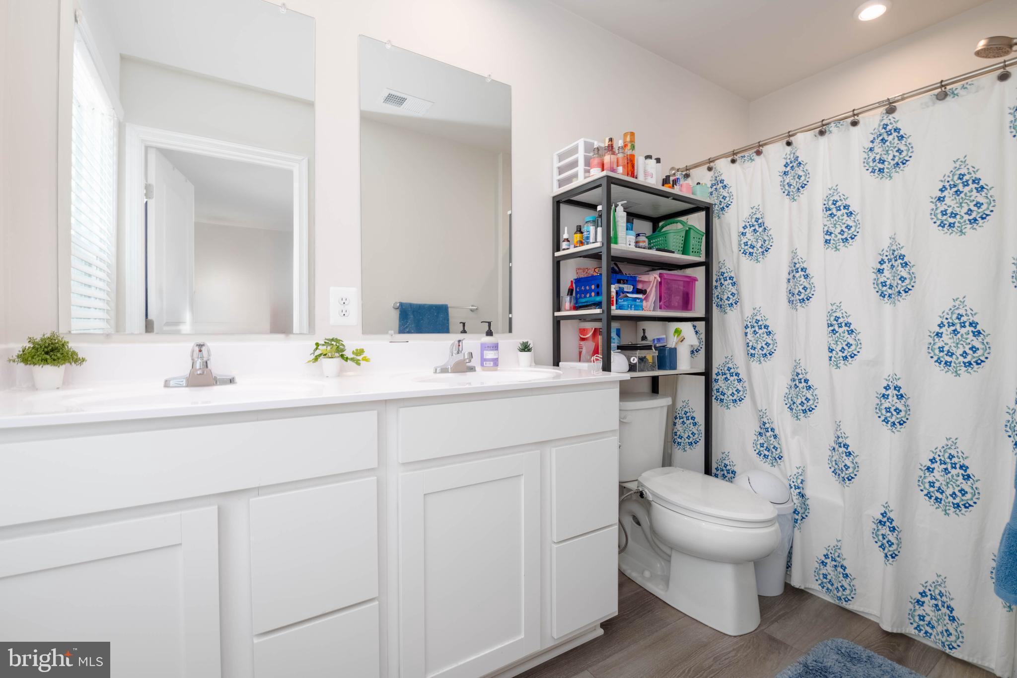 25 Teatree Lane Elkton, MD 21921 - Photo 22 of 38 a bathroom with a sink toilet and shower