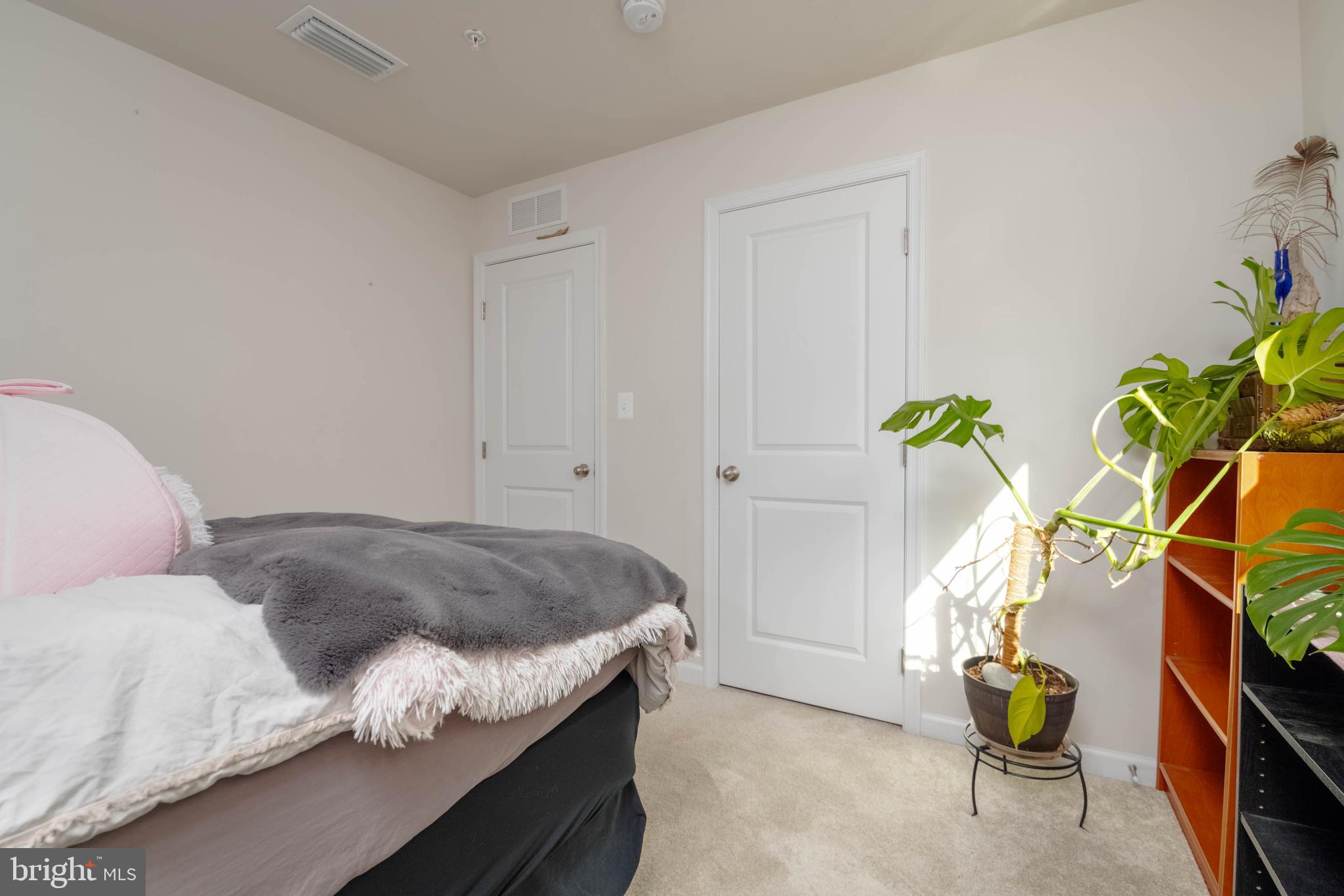 25 Teatree Lane Elkton, MD 21921 - Photo 25 of 38 a bedroom with a bed table and chair