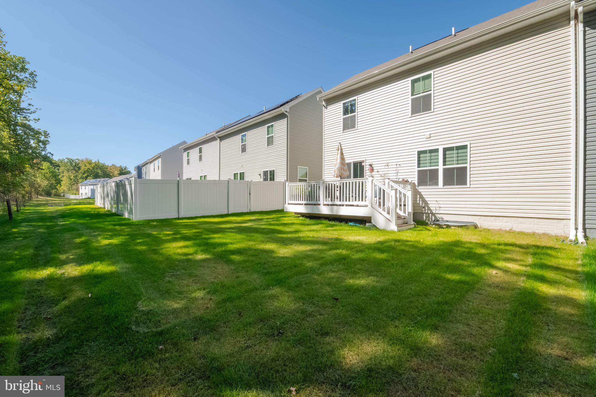 25 Teatree Lane Elkton, MD 21921 - Photo 37 of 38 a backyard of a house with table and chairs