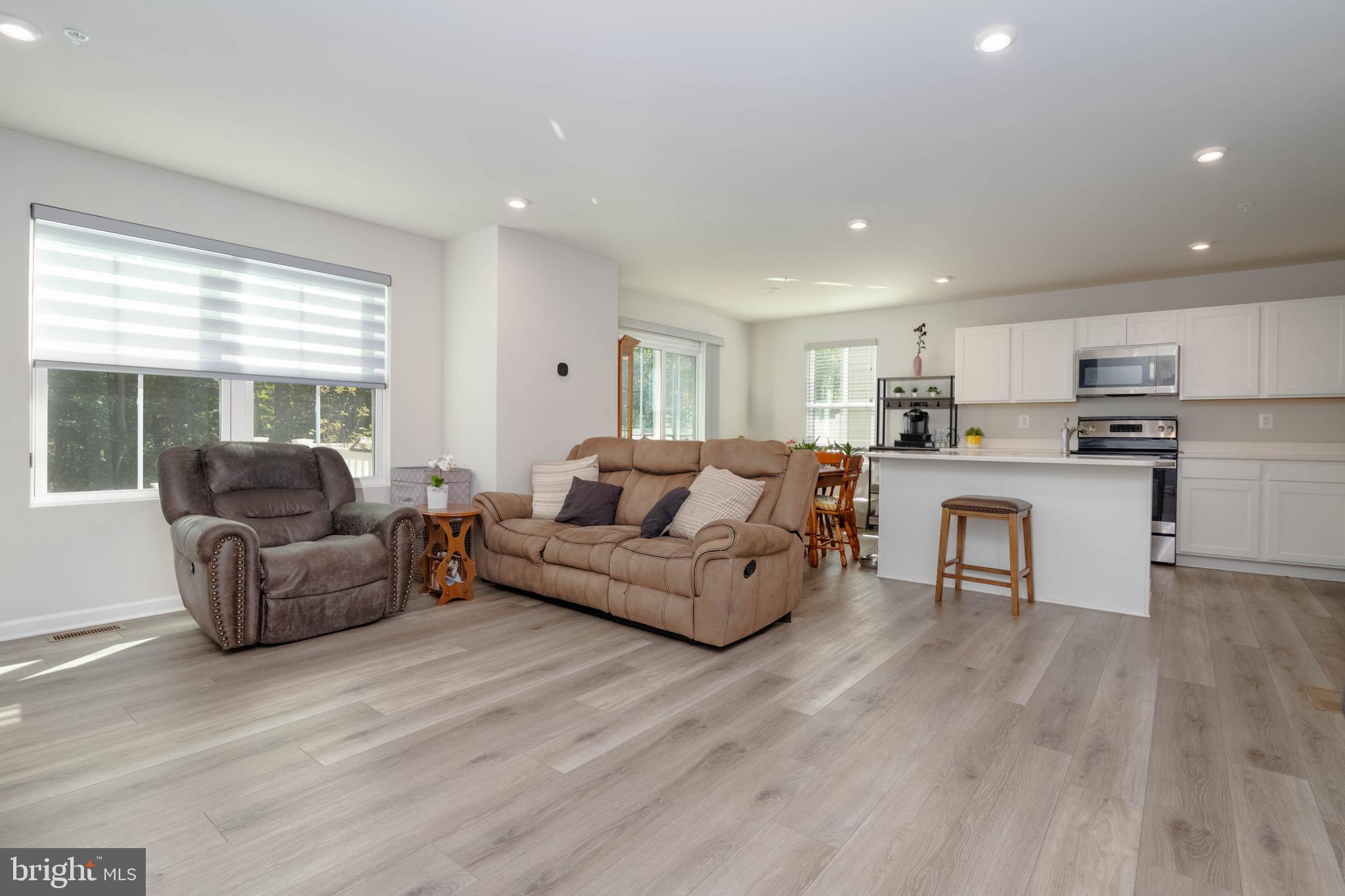 25 Teatree Lane Elkton, MD 21921 - Photo 9 of 38 a living room with furniture and a wooden floor